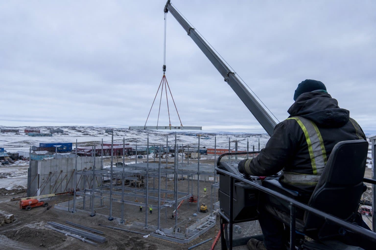 Cover image for article: Kaktovik crane operator who fought 2020 fire now helps rebuild school