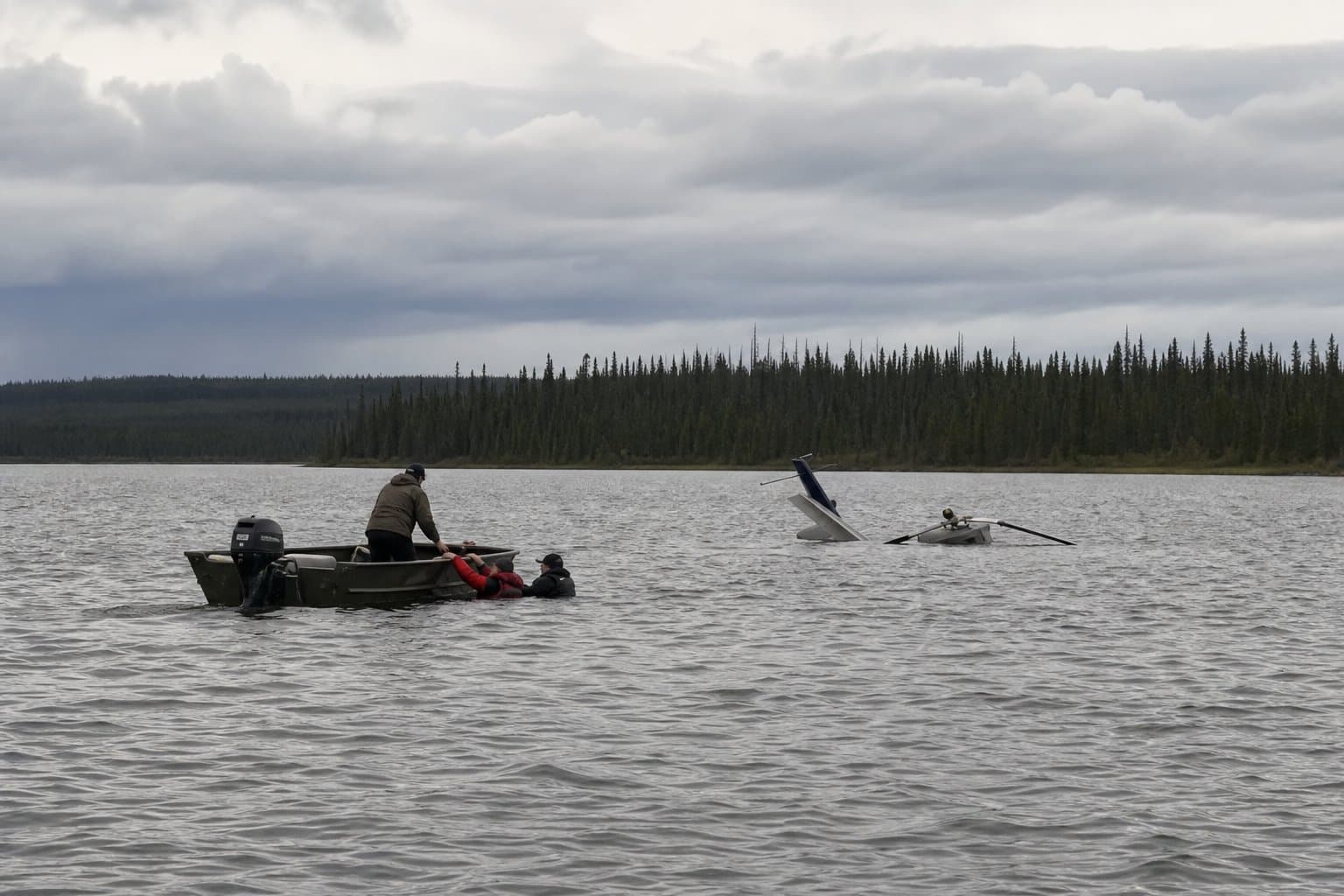 Cover image for article: Helicopter sinks in Chelatna Lake; bystander pulls both survivors from water