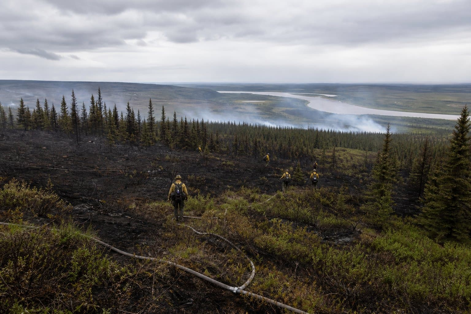 Cover image for article: Notakok Fire held at 55 acres one mile from Kaltag as smokejumpers begin to stand down