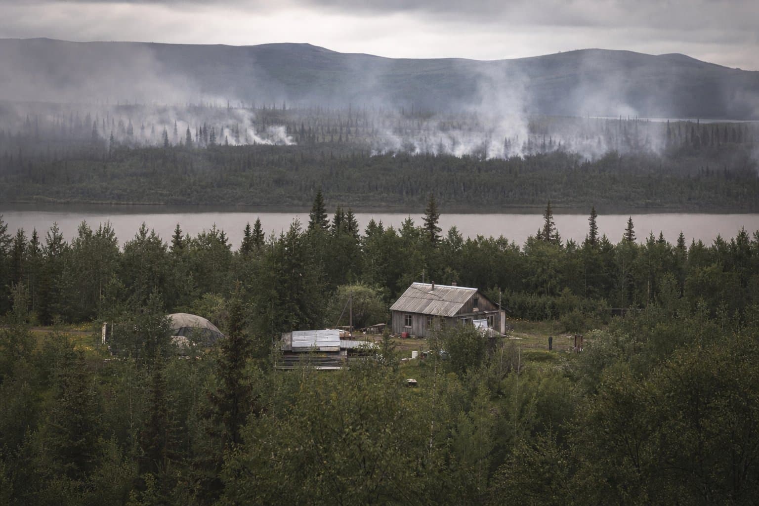 Cover image for article: Smokejumpers were called to a fire near a Kuskokwim homestead — then couldn't jump
