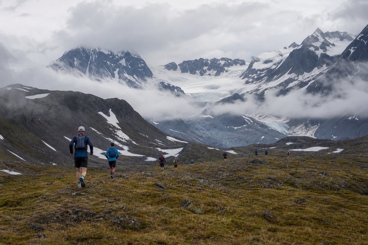 Cover image for article: Hikers take two days. Crow Pass runners do it in hours