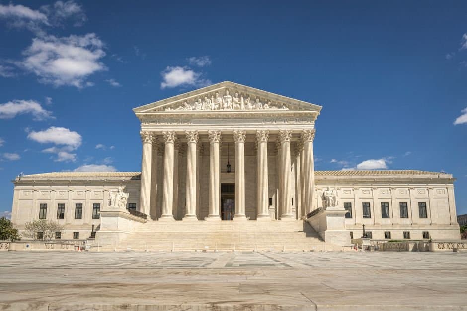 Cover image for article: Supreme Court hears Boulder climate case as Alaska backs oil companies