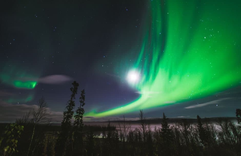 Cover image for article: Coronal hole wind lights up Fairbanks aurora through bright moonlight