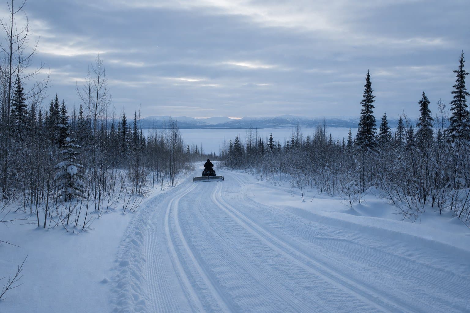 Cover image for article: Big Lake's trail groomers are asking the state for a snowmachine
