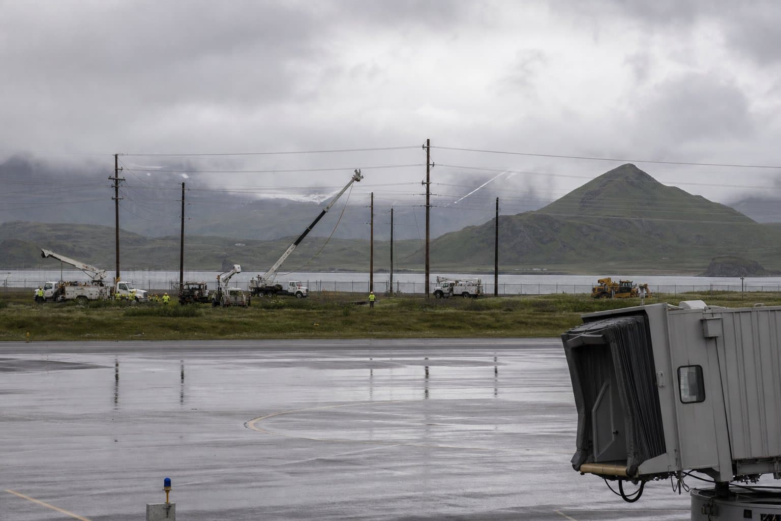 Cover image for article: Unalaska approves airport gate power line, with the state covering the cost