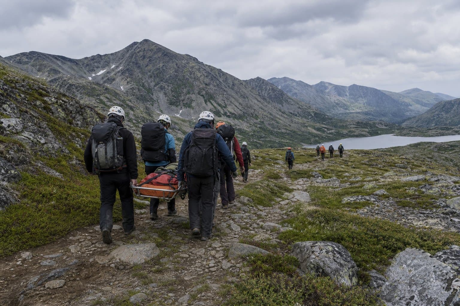 Cover image for article: Responders carry incapacitated hiker off Reed Lake Trail in Hatcher Pass