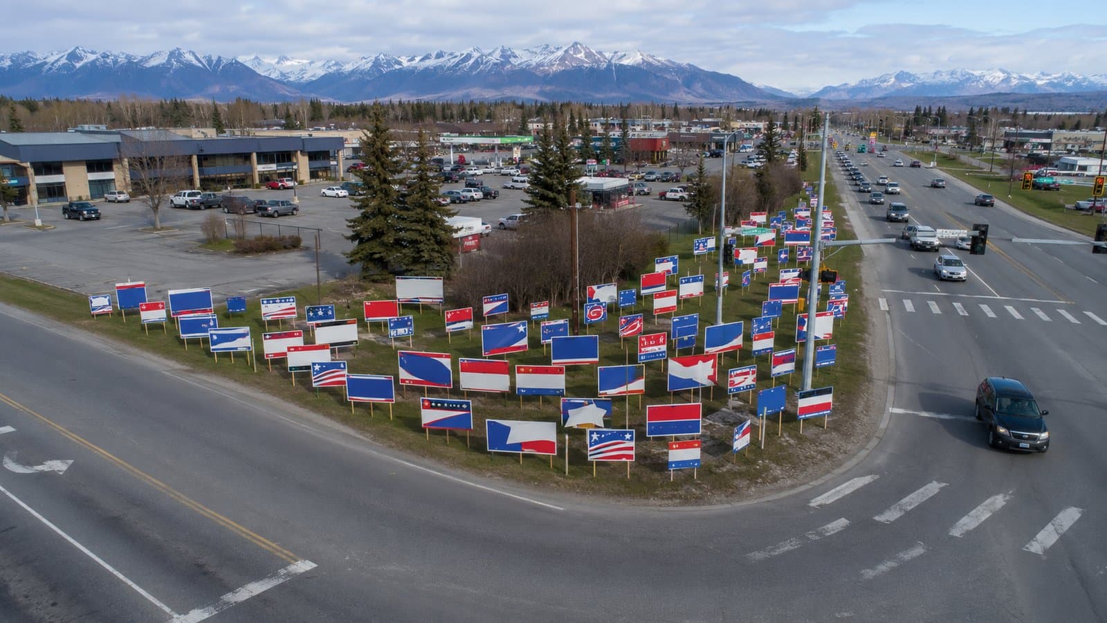 Cover image for article: Alaska banned billboards. Every election, candidates test whether the law means them too.