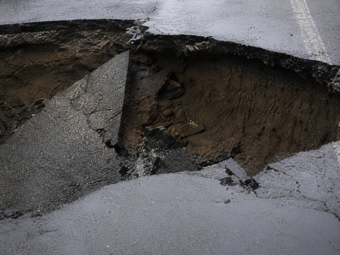 Cover image for article: A sinkhole swallowed a Seward Highway lane, and that lane is closed for a month