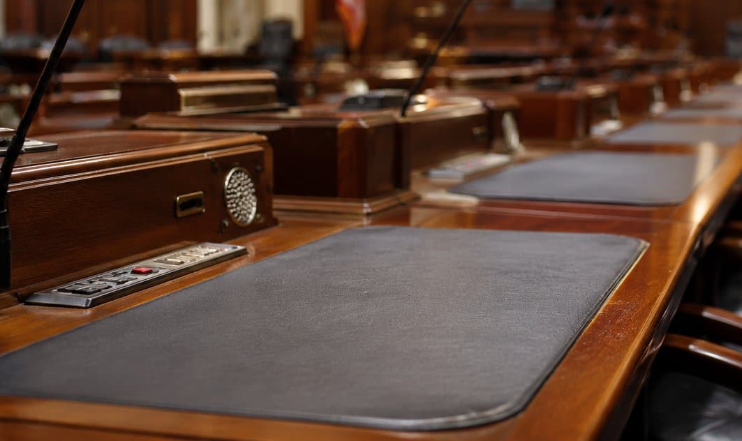 Cover image for article: Alaska House passes pay-card wage bill after fee provision removed