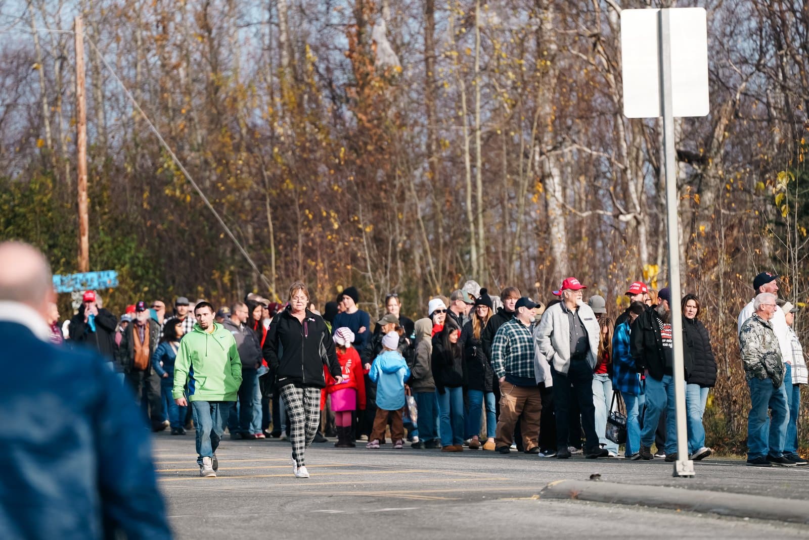 The shuttle line stretches through the parking area near Church on the Rock in Wasilla ahead of Donald Trump’s event at the Menard Center on Oct. 13, 2026.