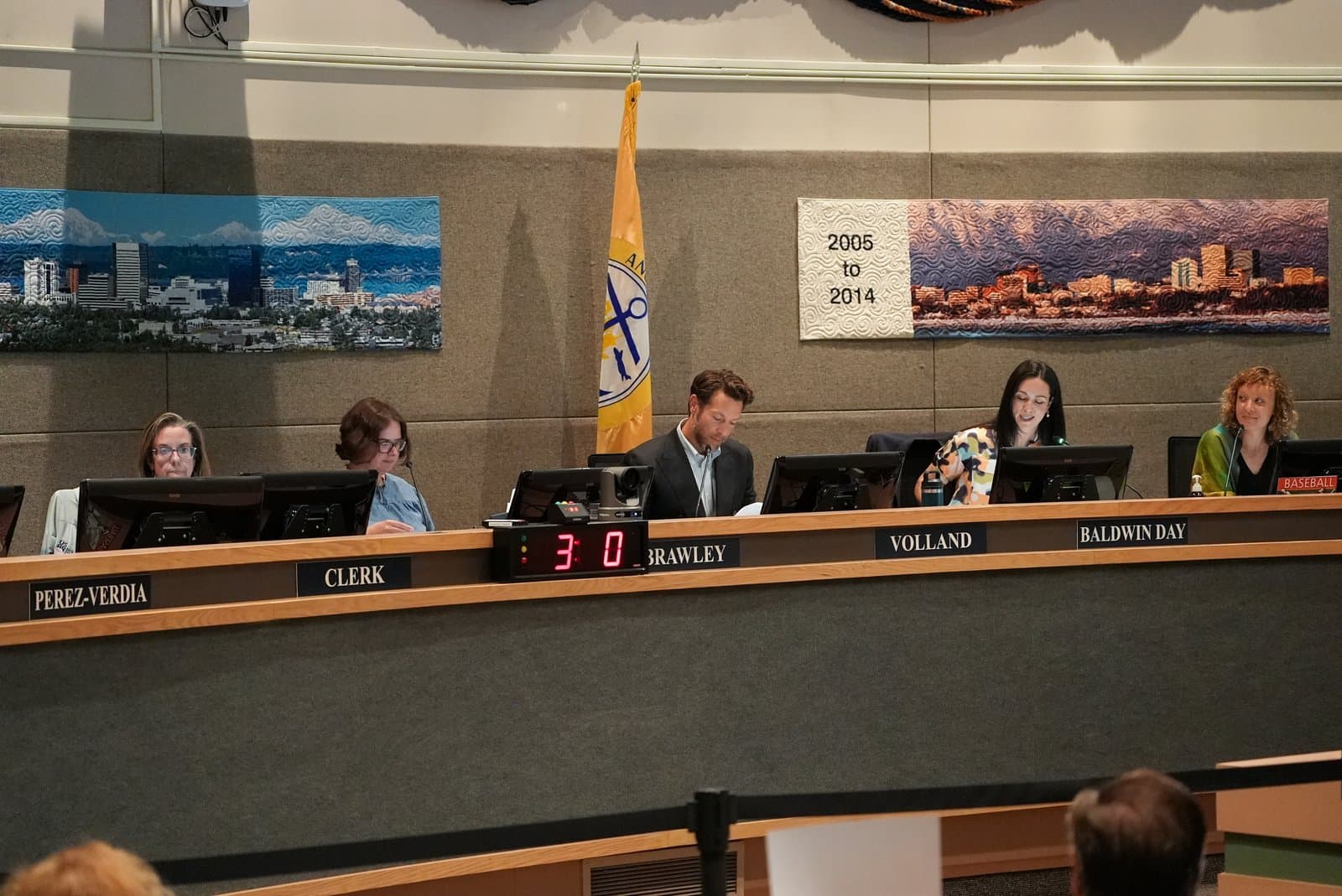 Members of the Anchorage Assembly sit at a dais during a public meeting held in Anchorage, Alaska, on June 23, 2026.