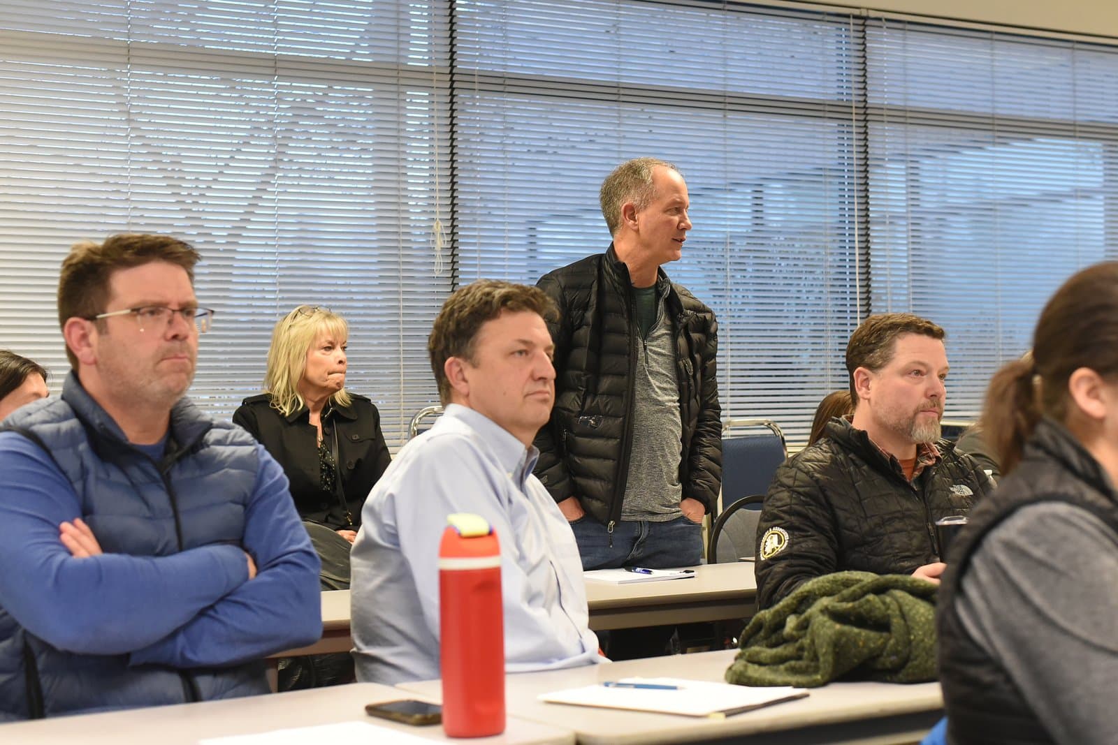 John E. Haxby stands to testify during the Anchorage AMATS TAC meeting held in a conference room on December 5, 2024.