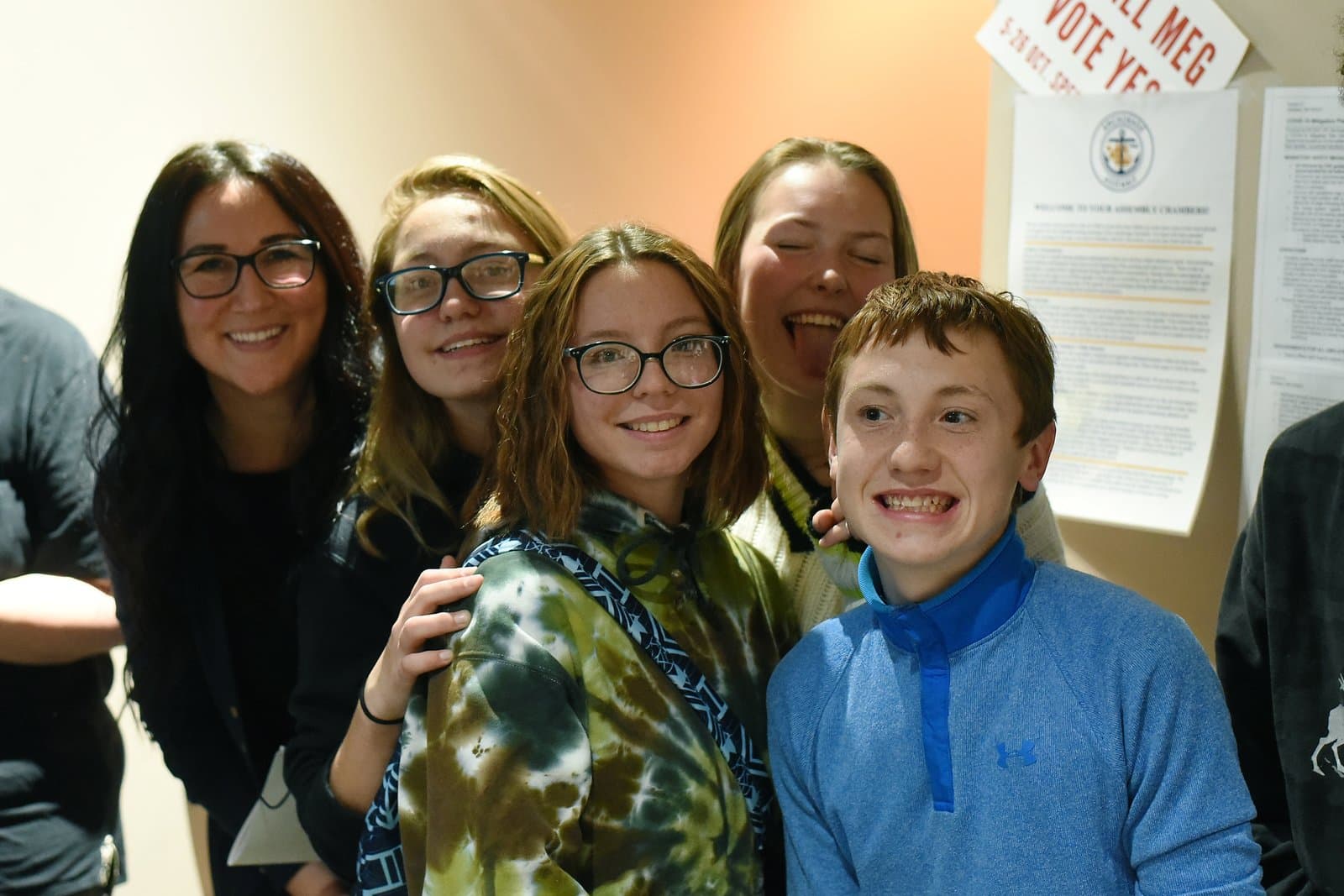 A group of young people pose for a photo during an Anchorage Assembly meeting held in Anchorage, Alaska, on October 7, 2021.