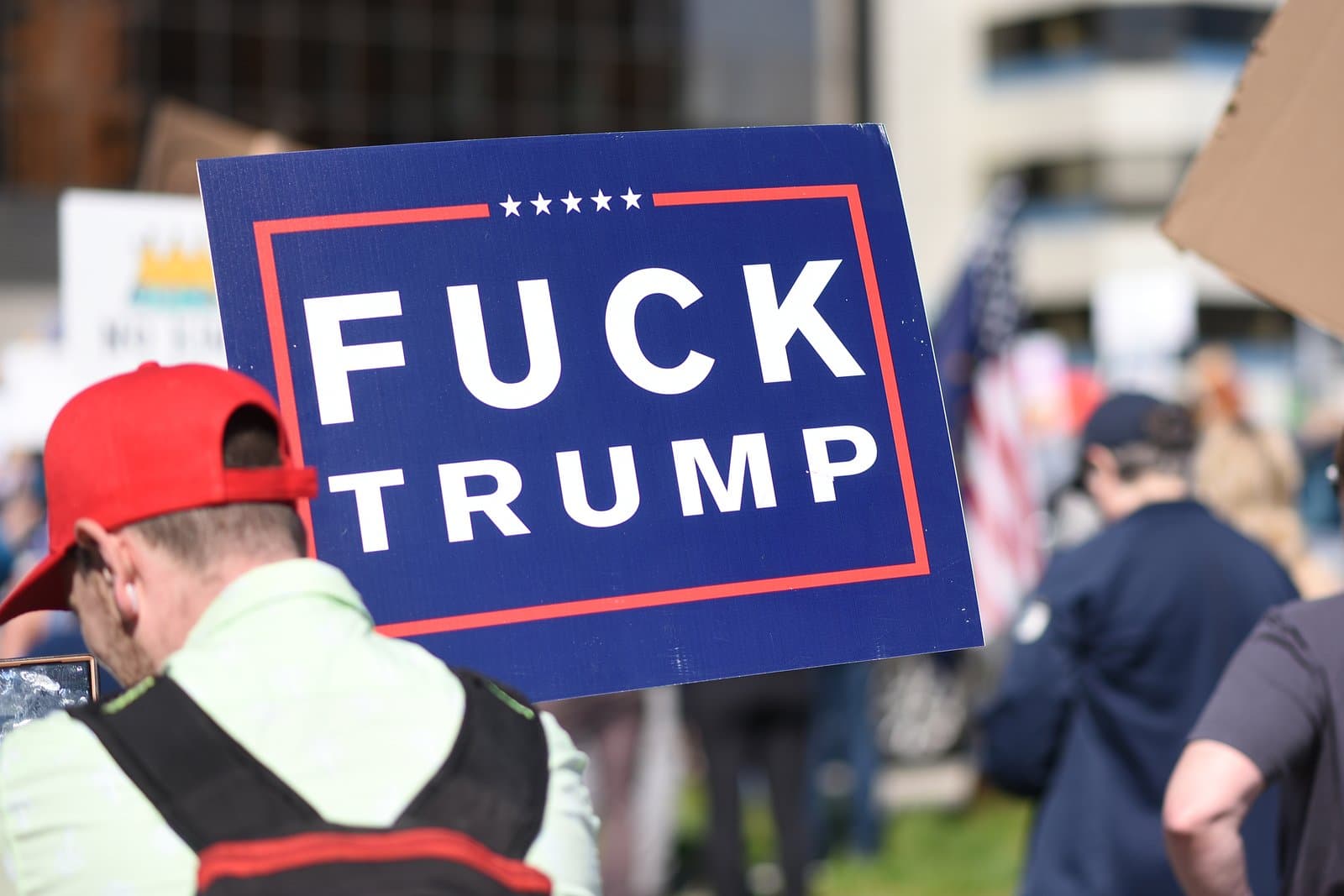 A protest sign reading "Fuck Trump" is held by a participant during a "No Kings" demonstration in Anchorage, Alaska, on June 14, 2025.